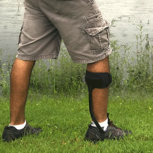 Man wearing Noodle AFO on right leg while fishing